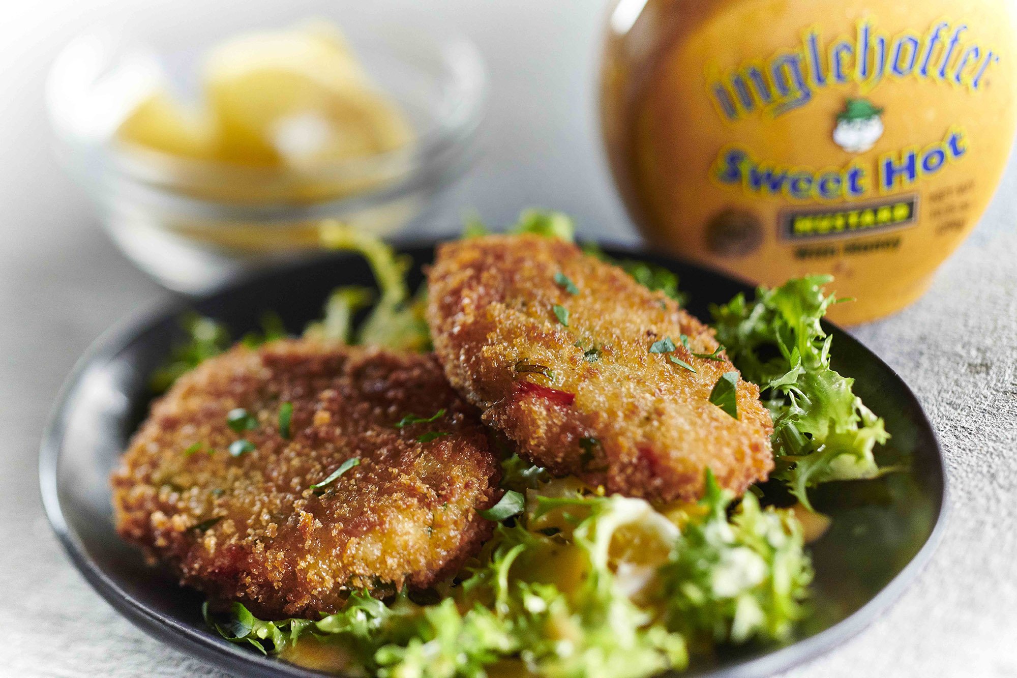 inglehoffer-sweet-hot-mustard-crab-cakes_slider Crab cakes over salad with Inglehoffer Sweet Hot Mustard